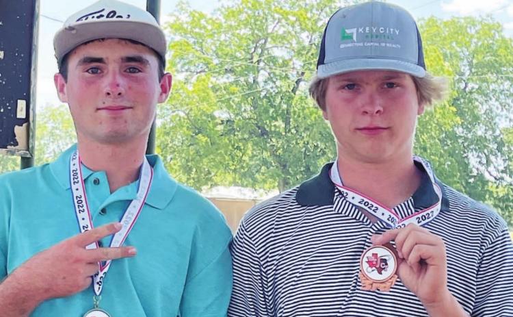 Peyton Spore, left, and Nick Haas pose with their second-and third-place medals from the San Saba tournament. COURTESY PHOTO