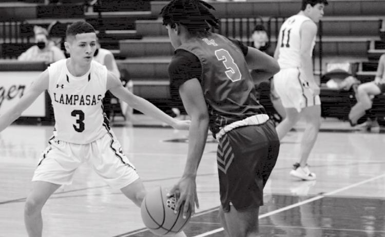 Jacob Hogeda, left, defends against Georgetown East View in the Badgers’ last home game before Thanksgiving. Thursday after press time, the Badgers were scheduled to play at Thorndale.