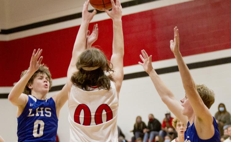 Nate Borchardt (left) and Quinn Pace defend against Salado on the way to a 59-53 road victory on Tuesday.