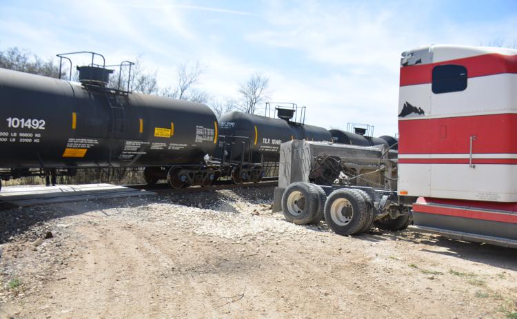 No injuries were reported to the crash that happened Monday afternoon between a train and an 18-wheeler. | Photo by Monique Brand