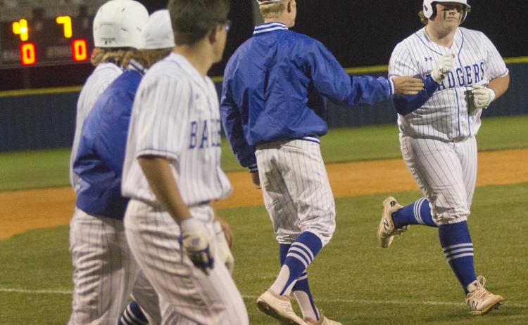 Teammates congratulate Hayden Waldrip, (far right) on a three-run home run in the bottom of the seventh against Gatesville on Thursday.