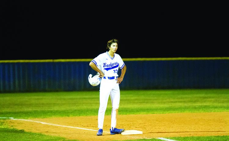 Jackson Wright catches his breath on base in a game earlier this season. HUNTER KING | DISPATCH RECORD