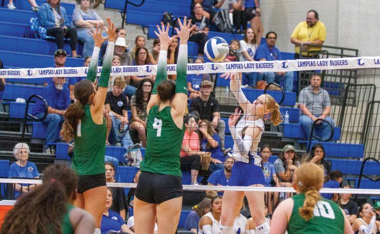 Lampasas outside hitter Mattie McBeth levels a slam over the net. ANA SOFIA MEYER | DISPATCH RECORD