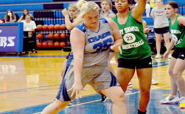 Kyliegh Ball (35) dribbles around a Burnet defender on Monday. JEFF LOWE | DISPATCH RECORD