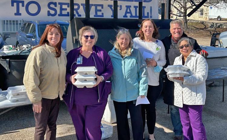 A drive-through Lampasas First Responders Appreciation Lunch, hosted by the Benny Boyd auto dealership, took place Jan. 25. Pictured here with staff from AdventHealth Rollins Brook are chamber member Teresa Thornton, far left, and Jamie Erickson, back right, who was responsible for coordinating the lunch. courtesy photo