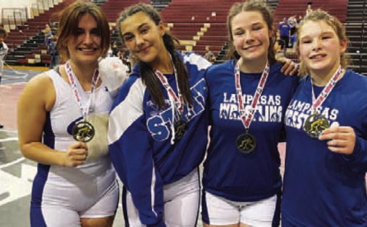 COURTESY PHOTO | DONOVAN KLECKNER Kaitlynn Jones, left, Charlie Freese, Jordan Winfree and Taylor Martell pose with their medals.