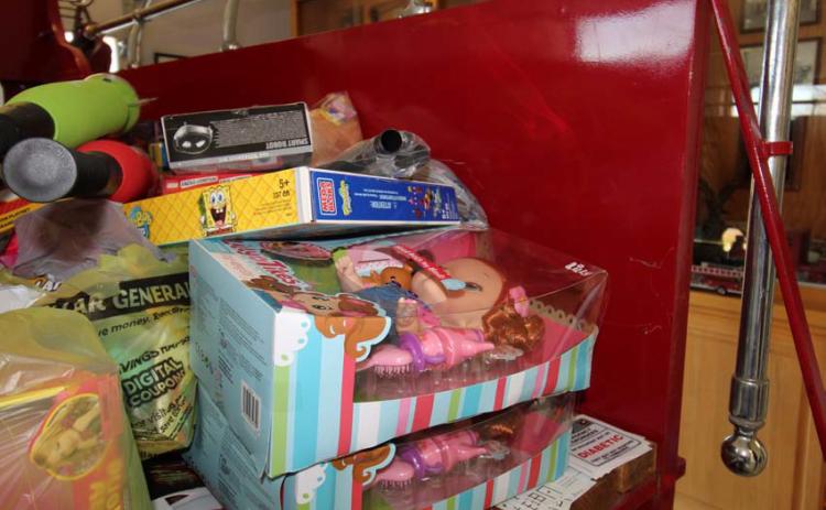 Local fire departments are doing all they can to help provide a merry Christmas for children in need, although toy donations are down about 50% from this time last year, officials said. Joycesarah McCabe | Dispatch Record