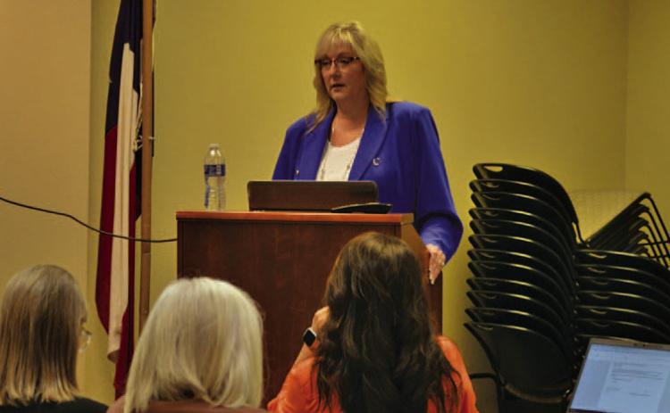 County Auditor Tragina Tallant presents budget and tax information for those gathered at this week’s public hearing. ERICK MITCHELL | DISPATCH RECORD