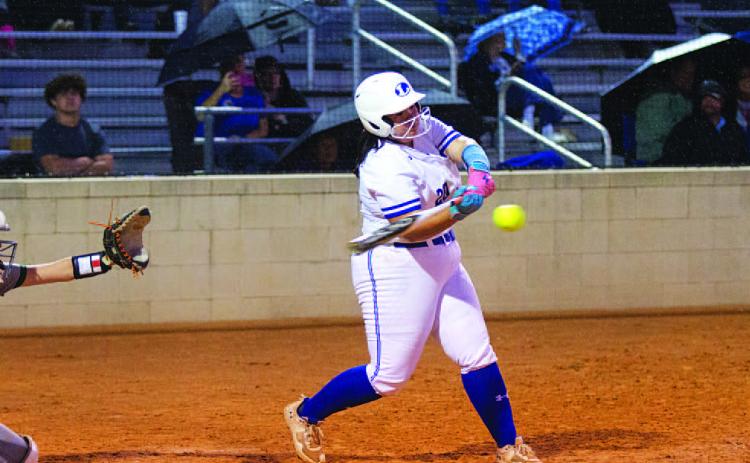 HUNTER KING | DISPATCH RECORD Amari Munoz hits a line drive to right center field late in Thursday’s contest.