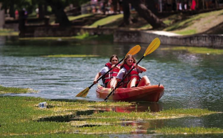 Kayak races have taken place during the annual Spring Ho Festival for years, but the public may soon be welcome to kayak and swim up and down Sulphur Creek with a potential change to city ordinances. FILE PHOTO