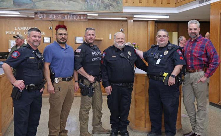 Sgt. Tony Barrio, center, was celebrated at a retirement reception for his years of service to the city. With the officer are, from left, Patrol Lt. Chuck Montgomery, Sgt. Investigator Fidel Morua, Coryell County Constable Guy Bevridge, Lampasas Police Sgt. Steve Sheldon and Police Chief Jody Cummings joycesarah mccabe | dispatch record