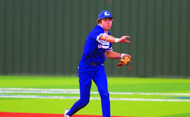 HUNTER KING | DISPATCH RECORD Owen Stubbs throws to first base to record an out during last Friday’s game against Jarrell.