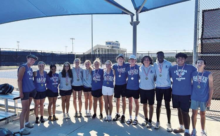 COURTESY PHOTO | KENNETH PEISER The tennis team poses for a photo after competing last Friday.