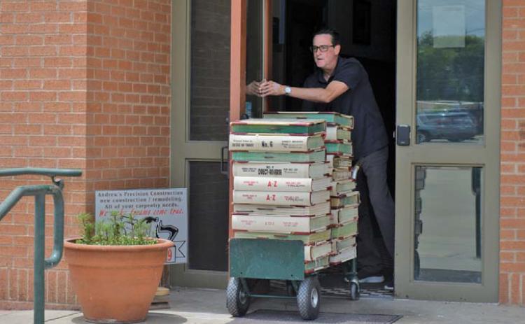 Kofile Premium Services representatives were in Lampasas in June to transport 30 years’ worth of deed records and index books from the Lampasas County Clerk’s Office to its headquarters in Dallas where digitization of the records has taken place. file photo