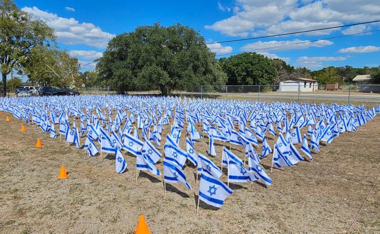 People from eight different ministries helped participate in putting up 1,200 flags over the weekend to memorialize the lives lost Oct. 7, 2023 in an attack on Gaza. “The event was a terrific success,” said Brian Parker, senior pastor of One Church Cove. The flags were on display this week at the Kempner Family Community Development Center. courtesy photo