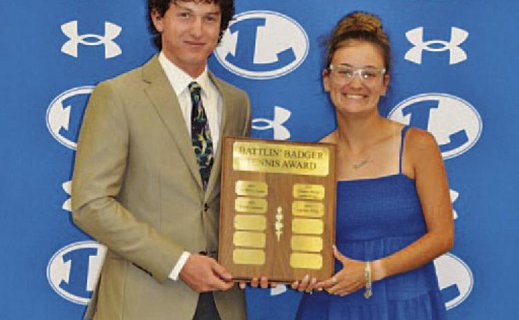 Elijah Copeland, left, and Caroline White won the Battlin’ Badger award for the 2025-2026 season. COURTESY PHOTO | KENNETH PEISER