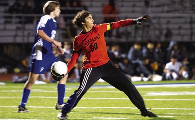 Michael Clayton throws the ball out to a teammate after making a save against Stephenville. HUNTER KING | DISPATCH RECORD