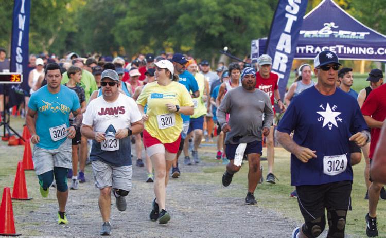 HUNTER KING | DISPATCH RECORD More than 400 total runners signed up to participate in the Spring Ho races last week.