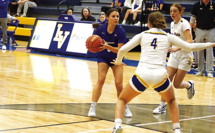 HUNTER KING | DISPATCH RECORD Chloe Thorp looks for a teammate to pass to during Tuesday’s game against Lago Vista.
