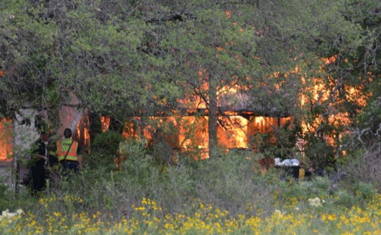 A fire Wednesday about 12:30 p.m. destroyed a residence off FM 2657, near FM 3046. MONIQUE BRAND | DISPATCH RECORD