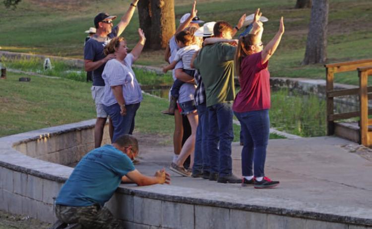 Members of the crowd at W.M. Brook Park were moved by the various performances during Gospel Night on Wednesday. MASON HINES | DISPATCH RECORD