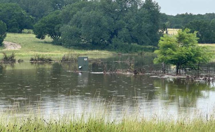 Ranch land used for forage is flooded in this recent photo. Emergency conservtion funds may be eligible to assist local farmers and ranchers as they work to recover from flooding. file photo