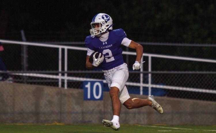 Senior Jonathan Bowling returns a kickoff against Jarrell last week. Bowling rushed for a total of 87 yards. PHOTO BY ANA SOFIA MEYER | DISPATCH RECORD