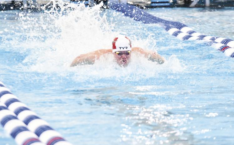 Jase Pinckney swims in the 100-yard butterfly, the event he will be competing in at the Olympic trials. COURTESY PHOTO