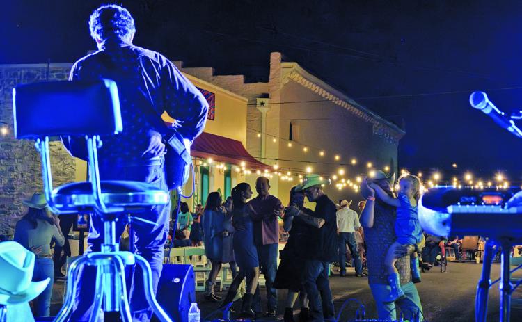 Attendees at the Lampasas County Museum’s Western on Westerm Street Dance enjoy time on the dance floor during Saturday’s event. ADAM BARRIOS | DISPATCH RECORD