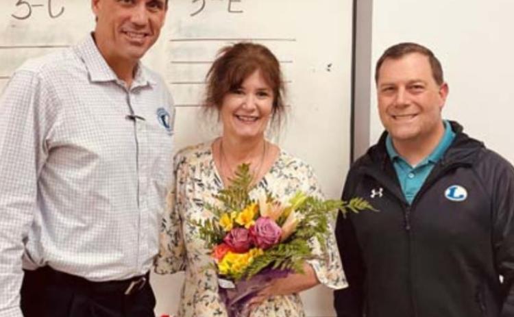 Marie McGuire was named the Secondary Teacher of the Year for the Lampasas Independent School District. She is pictured with Superintendent Dr. Chane Rascoe, left, and Lampasas Middle School Principal Wes Graham. COURTESY PHOTO