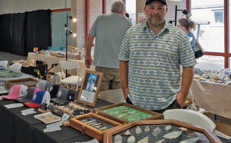 Amateur Archeologists of Texas owner Gabriel DeLaune showcases his collection of arrowheads at Saturday’s Indian Artifact &amp; Mineral and Gem Show hosted by Vision Lampasas. Adam Barrios| Dispatch Record