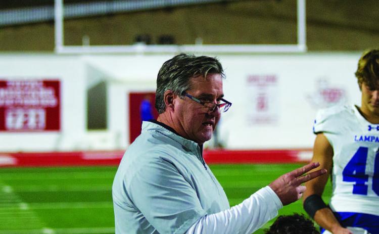 HUNTER KING | DISPATCH RECORD Head coach Troy Rogers addresses his team after the loss last Friday night.