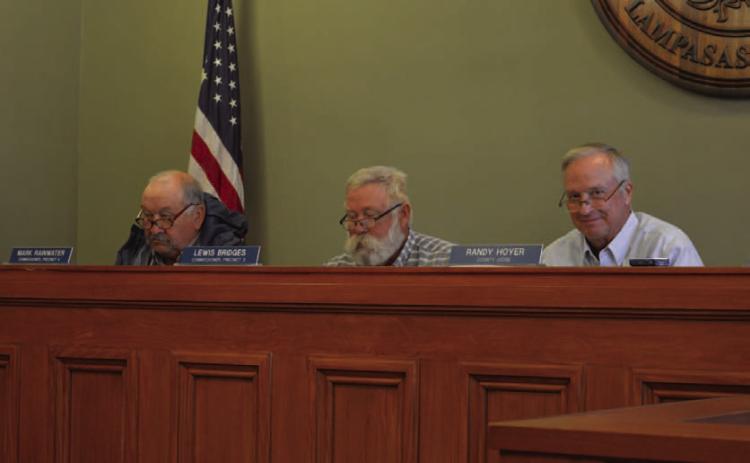 County Judge Randy Hoyer, at right, is shown with Precinct 4 Commissioner Mark Rainwater, left, and Precinct 3 Commissioner Lewis Bridges. Hoyer discussed with the Commissioners Court what he had learned at a recent meeting about the advantages of creating a regional water supply. ERICK MITCHELL | DISPATCH RECORD