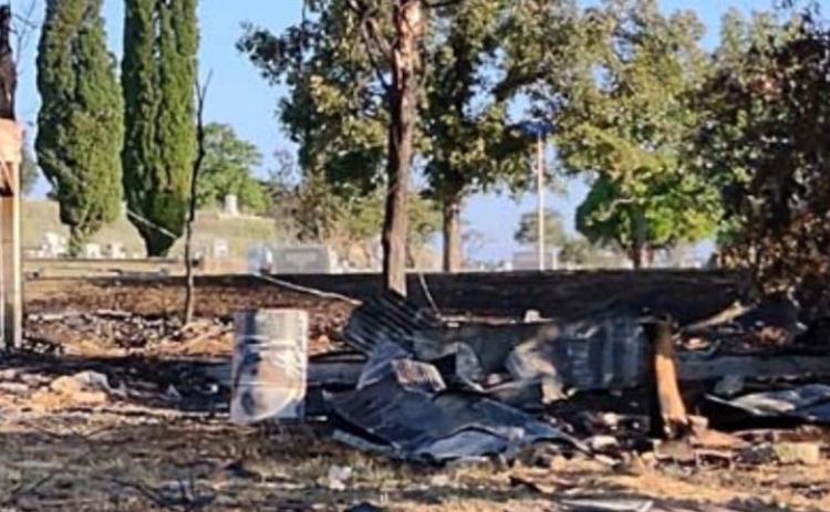 A building in the 1000 block of West Avenue B was destroyed Wednesday when flames in barrels outside the building caught the structure on fire, Lampasas Fire Chief Jeff Smith said. DAVID LOWE | DISPATCH RECORD