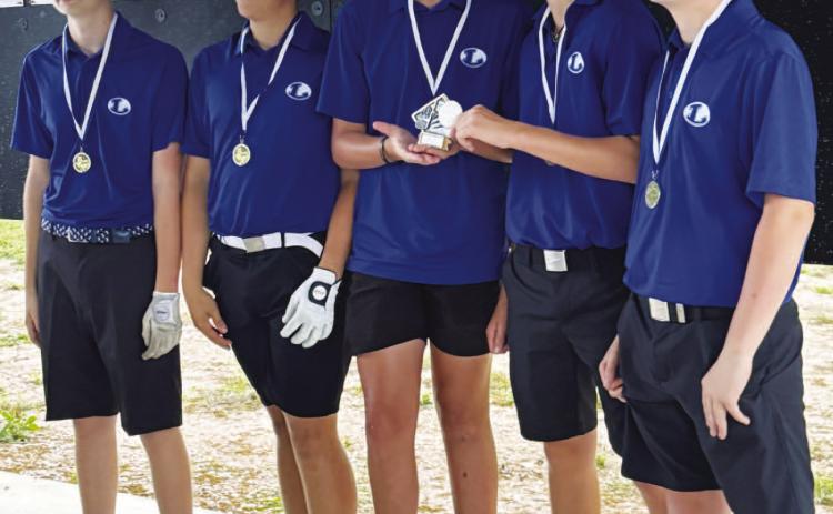 From left, Jem Moore, Noah Harrell, Henry Shahan, Brayden Brewer and Zane Nelson pose with their district championship trophy. COURTESY PHOTO