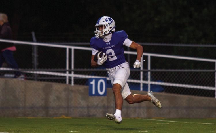 ANA SOFIA MEYER | DISPATCH RECORD Senior Jonathan Bowling returns Jarrell’s kickoff to start the first quarter.
