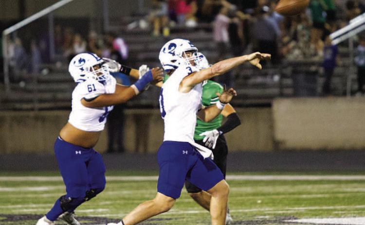 Reed Jerome launches a pass to Jaden McElwain for the game-winning touchdown. HUNTER KING | DISPATCH RECORD