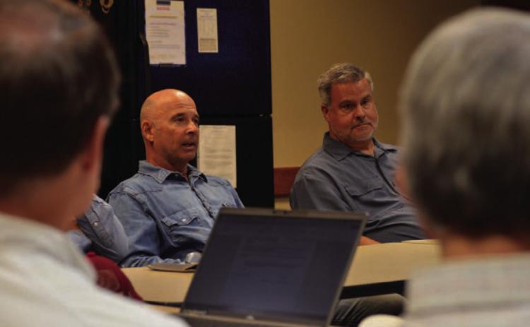 Saratoga Underground Water Conservation District Precinct 1 Director Stan Wilson, left, and Precinct 2 Director Reuben Martinez look on during Monday’s workshop with the Lampasas County Commissioners Court. Saratoga UWCD is seeking additional funding from the county to ensure the district is fulfilling its duties as required by state law. ERICK MITCHELL | DISPATCH RECORD