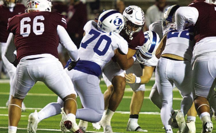 Cameron Russell makes a tackle during last week’s win over Uvalde. HUNTER KING | DISPATCH RECORD