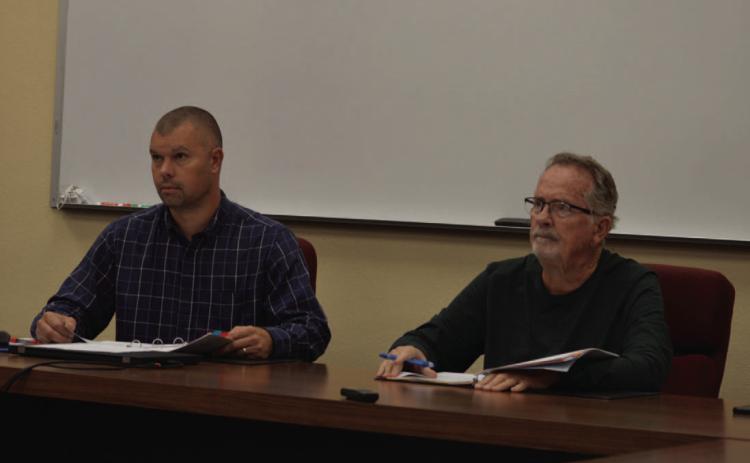 ERICK MITCHELL | DISPATCH RECORD Lampasas Central Appraisal District Board of Directors Chairman Marshall Brewer, left, and Board Secretary Philip Garrett look on during Thursday’s meeting.