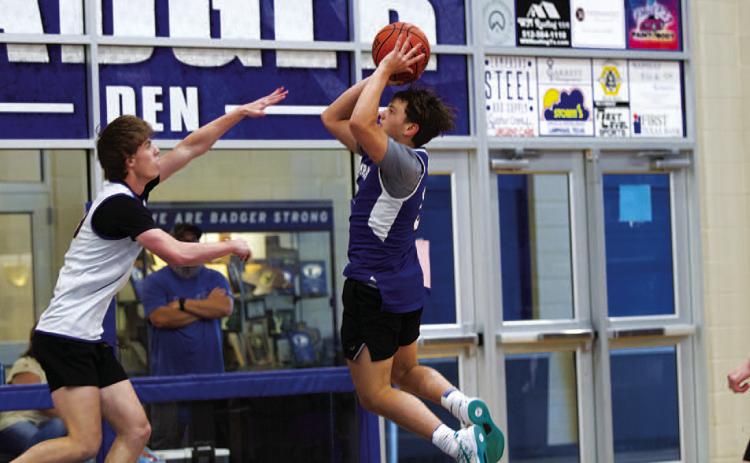 HUNTER KING | DISPATCH RECORD Dylan Polmanteer shoots over the outstrectched hand of a Lago Vista defender.