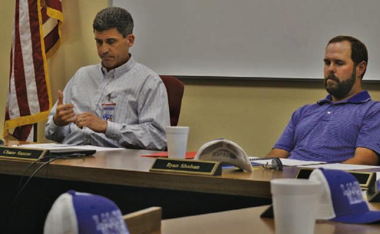 At left, Lampasas ISD Superintendent Dr. Chane Rascoe and Board of Trustees President Ryan Shahan reflect on 2025-26 FY budget figures during last week’s special called meeting. ERICK MITCHELL | DISPATCH RECORD