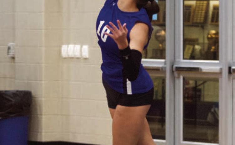 Ysabella Swain rises up for a serve in a match earlier this season. Swain’s senior leadership in the middle continues to be a boon for the Lady Badgers as the season goes on. ERICK MITCHELL | DISPATCH RECORD