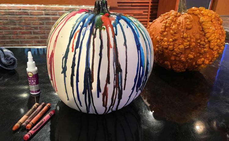 Extend the life of pumpkins by creating crayon-dripped decorations rather than carving them. photo | melindamyers.com