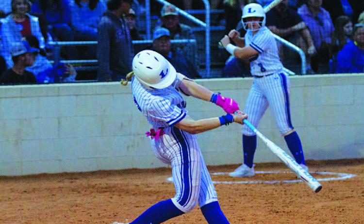 HUNTER KING | DISPATCH RECORD Aspen Wheeler swings at a pitch early in Tuesday’s game against Marble Falls.