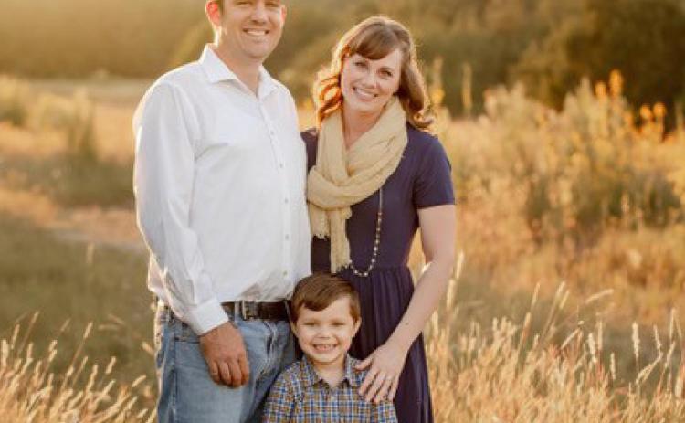 Andrew and Stephany Strouth are pictured with their adopted son, Kaysen. COURTESY PHOTO