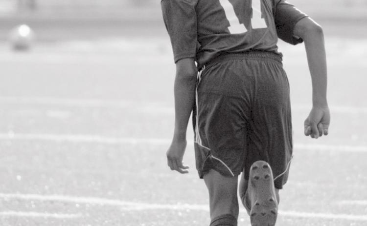 Zimri Vergara moves the ball down field on Monday. Vergara scored once against the Eagles. JEFF LOWE | DISPATCH RECORD
