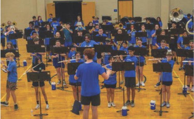 Band students practice indoors during summer camp in preparation for the marching season this fall. courtesy photo | rachel k gill photography
