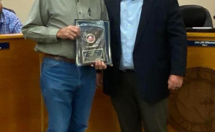 Kempner Municipal Judge and former mayor Gene Isenhour, left, stands with current Kempner Mayor John Wilkerson and honored with the city’s inaugural Impression Award. CITY OF KEMPNER FACEBOOK PAGE