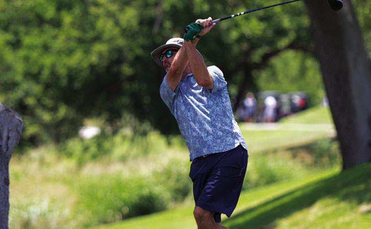 HUNTER KING | DISPATCH RECORD Shane Baxter tees off on the first hole at Hancock Park Golf Course.